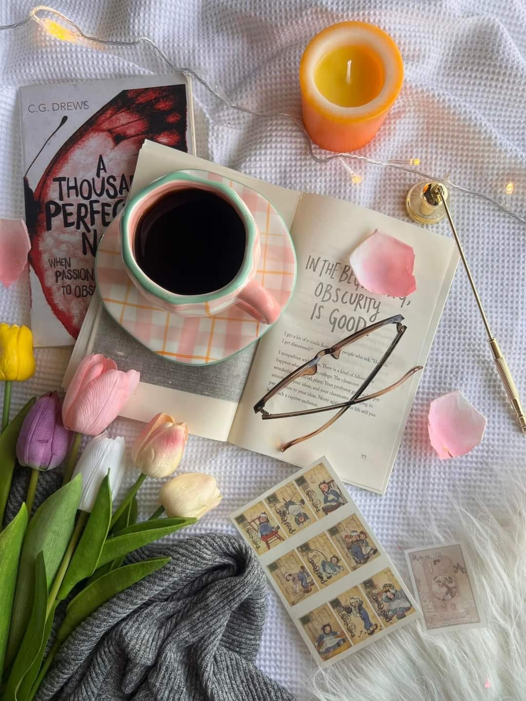 Cup of coffee on top of a book